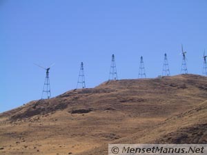 Hills cut for terraced foundations look like oil derricks