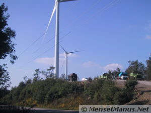 Windmills and construction trucks